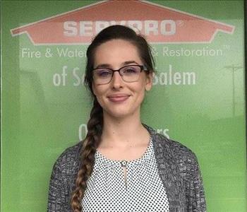 Female employee with long brown hair 